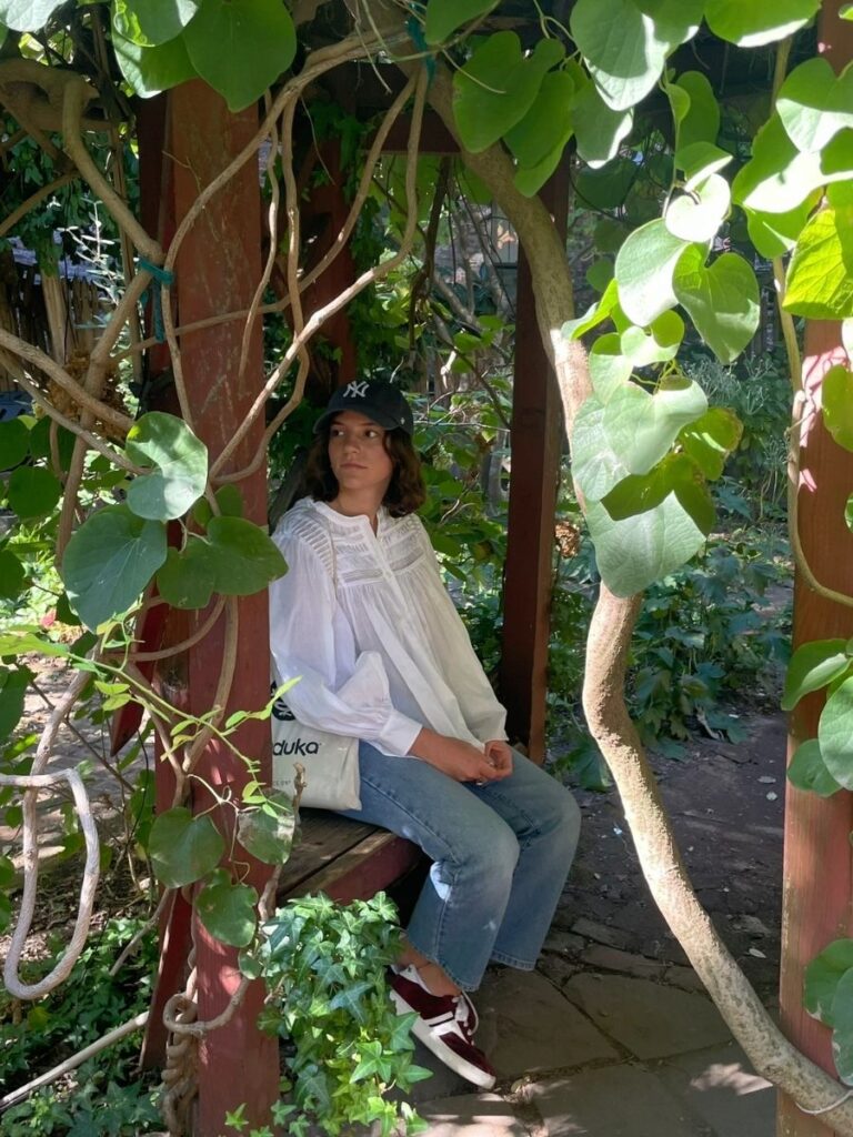 sitting in a garden park in east village