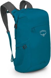 Osprey daypack for hiking and travel with padded straps and storage pockets.