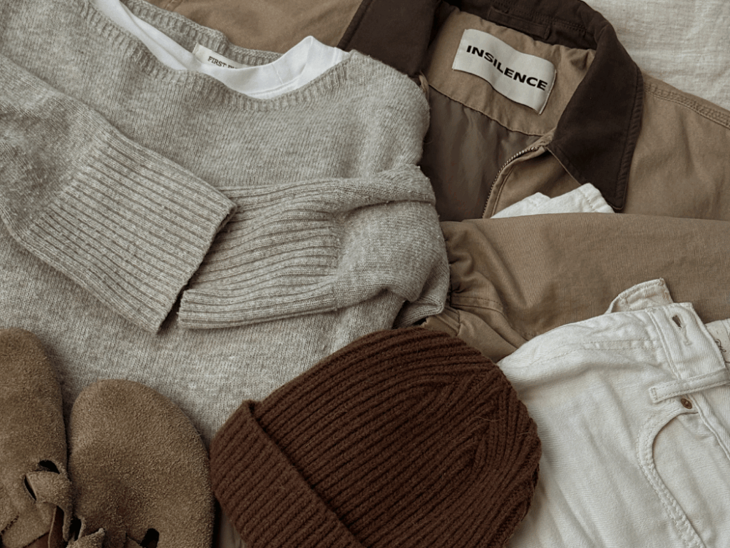 a sweater and coat perfect for winter travels